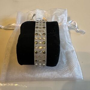 Swarovski silvery/grey bejeweled leather bracelet.